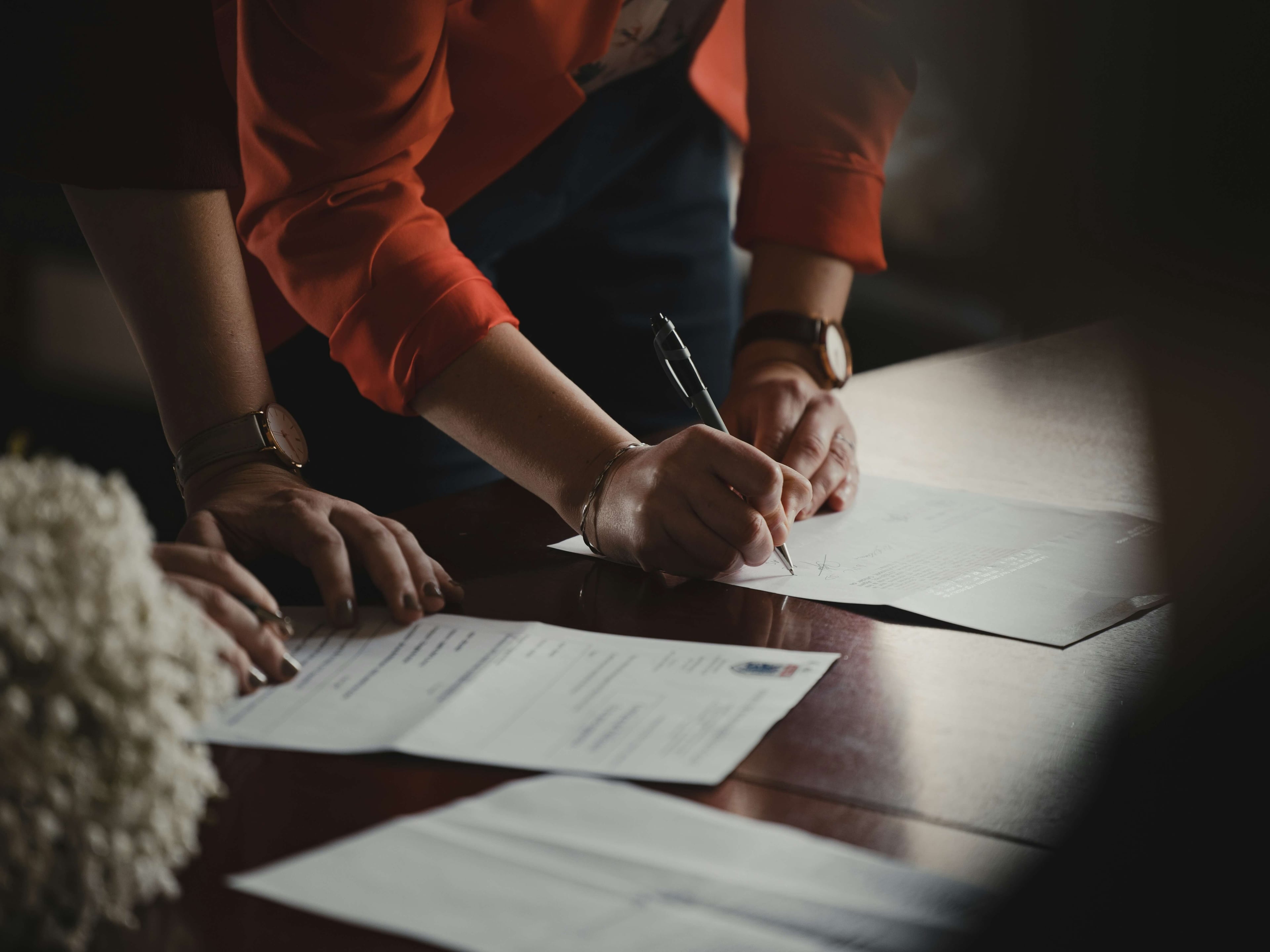 Property owner signing real estate documents